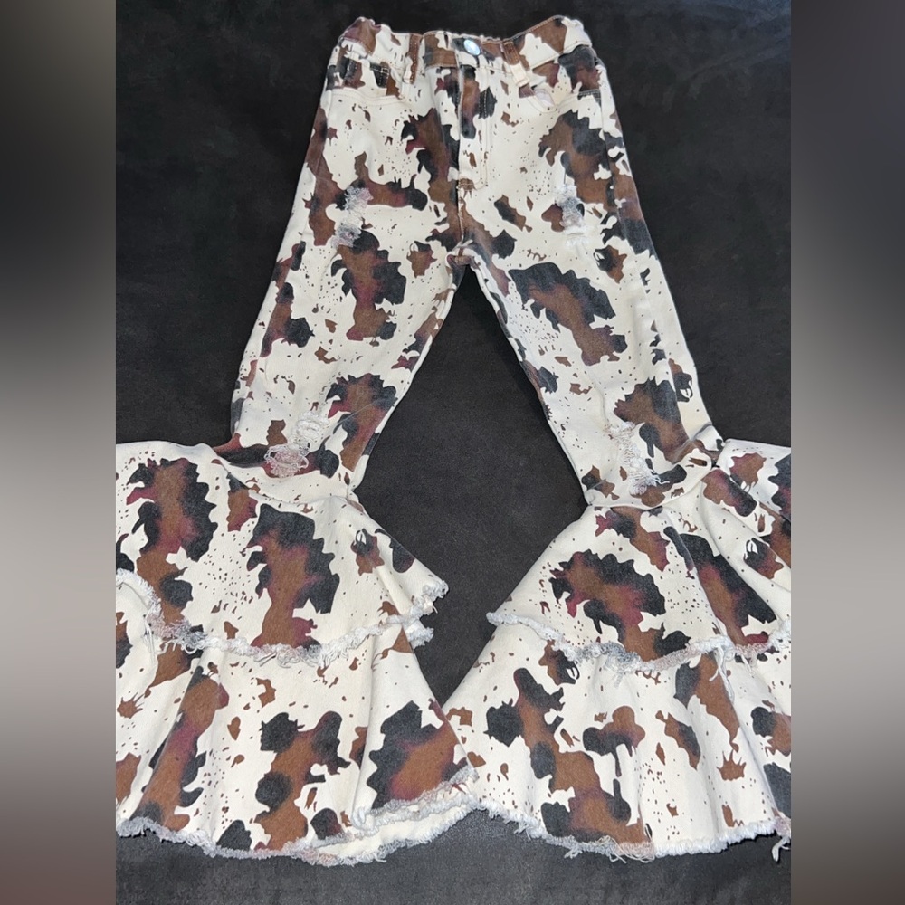 Cow print bell bottoms